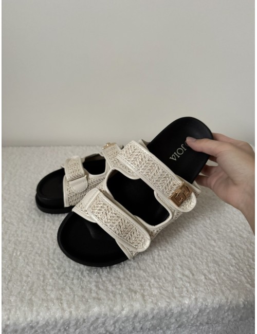 Mules plates beiges en raphia